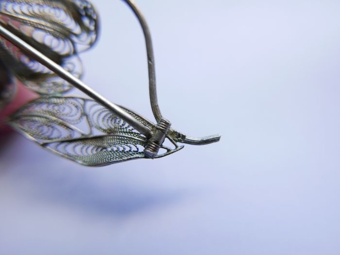 Vintage silver filigree flower brooch