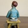 Vintage Porcelain Shoe Cobbler Sitting On Bench Figurine 5 Inches High Image 2