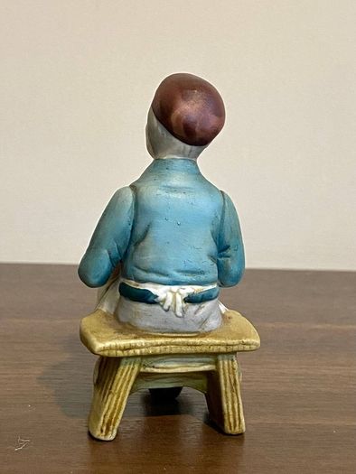 Vintage Porcelain Shoe Cobbler Sitting On Bench Figurine 5 Inches High