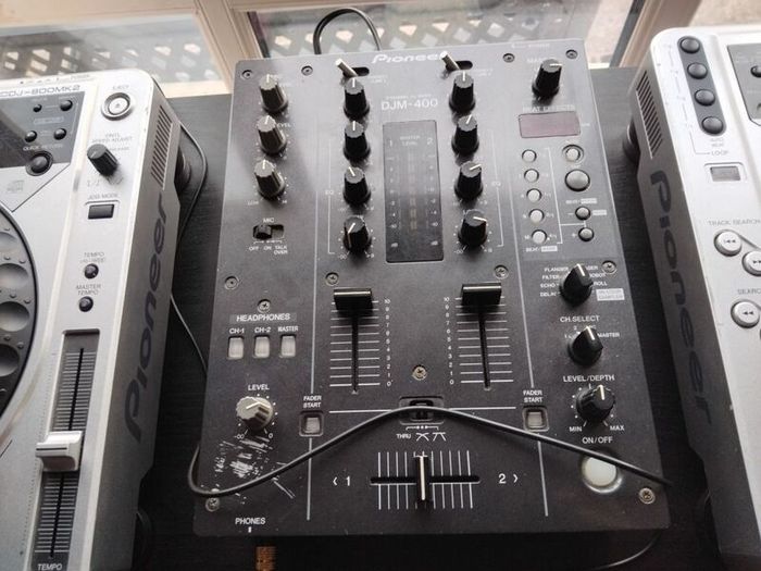 Plug and play pioneer Cdjs mixer and cds... NOTHING SOLD SEPARATELY