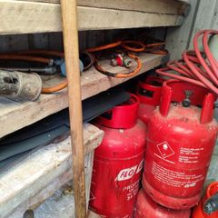4 no full bottles of Flogas.