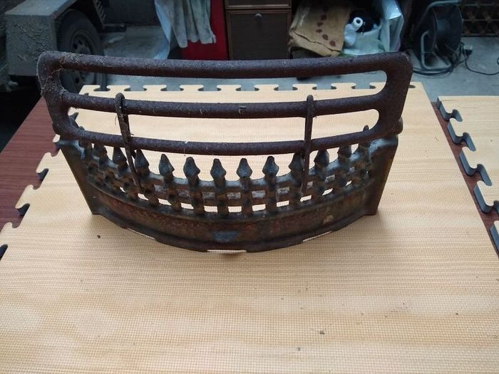 Clip on fire grate coal saver