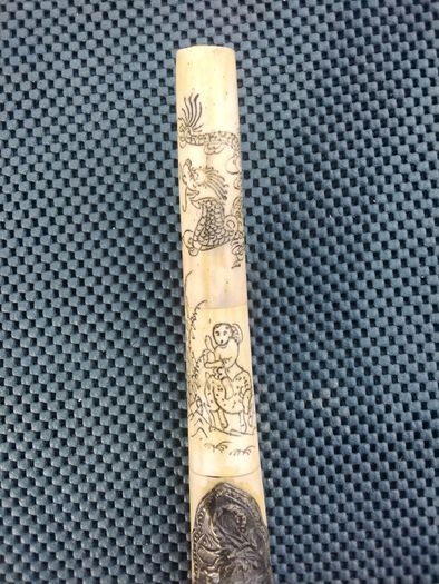 Carved walrus tusk