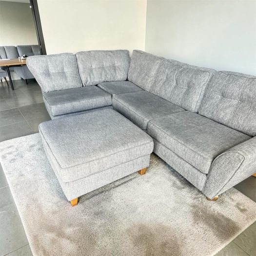Grey corner sofa with matching footstool