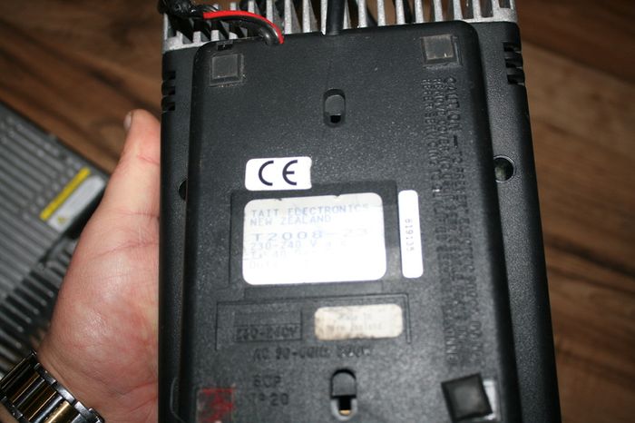 Tait TM8235 VHF 174-225 MHz - 2 Way Portable Radio and Tait T2000 Desktop Power Supply For Base Radio