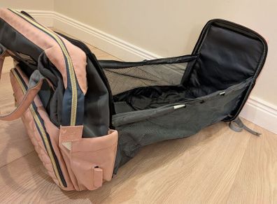 Baby diaper bag with built in changing station
