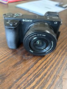 Sony Alpha a6500 mirrorless camera with the Sony 16 50mm f/3.5 5.6 OSS power and zoom kit lens.