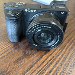 Sony Alpha a6500 mirrorless camera with the Sony 16 50mm f/3.5 5.6 OSS power and zoom kit lens.