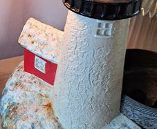 Cast iron lighthouse doorstop