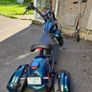 Fully Electric Chopper/Harley looks like a motorbike with matching side boxes Image 2