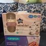 Breast pump baby bottles and baby clothes Image 2