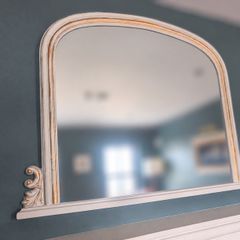 Decorative arched mirror with white and gold frame