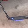 Nine bot e scooter with leds lights on the bottom of the frame. It's able to fold to make it easy to transport Image 3