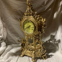 brass antique quartz clock