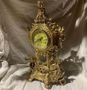 brass antique quartz clock