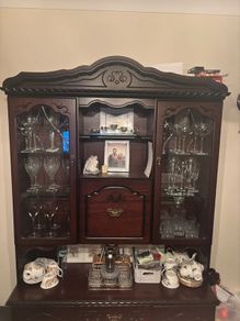 Dark wood antique china cabinet
