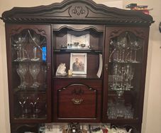 Dark wood antique china cabinet