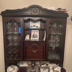 Dark wood antique china cabinet