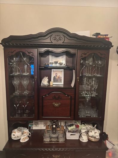 Dark wood antique china cabinet