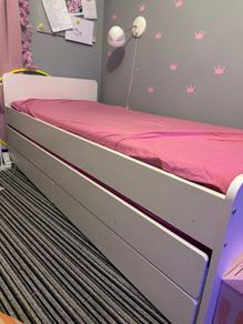 Single bed with trundle bed and storage