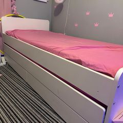 Single bed with trundle bed and storage