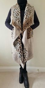One size, reversible faux short fur long gilet
