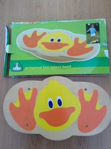 Wooden balance board to improve balance and agility