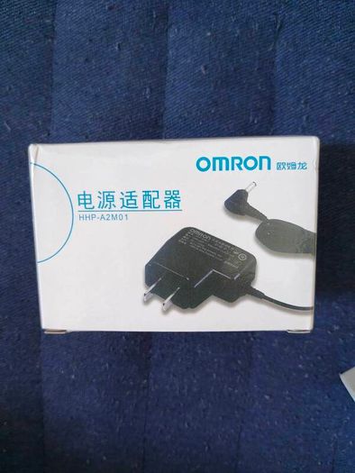 omron blood pressure monitor power supplier