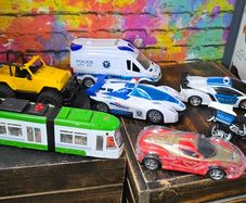 7 x Battery powered toy vehicles with lights and sounds
