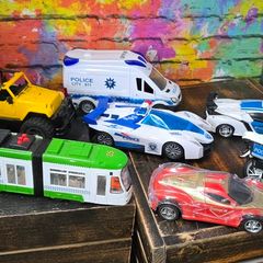 7 x Battery powered toy vehicles with lights and sounds