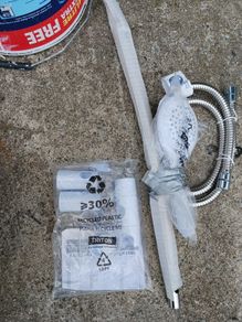 Triton Mira Shower head and wall arm.