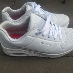Women's white Skechers on Air sneakers