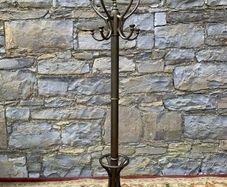 Heavy Bronze Effect Coat and Hat Stand.