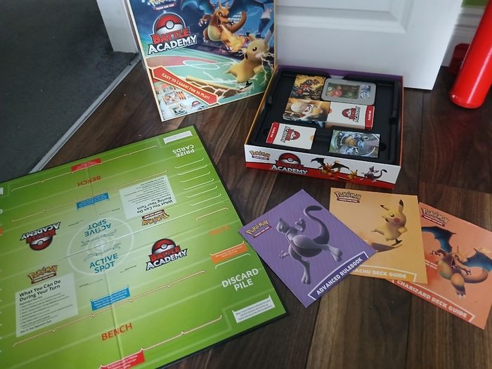 Playroom clear out - Pokemon battle board game with multiple pokemon card sets, excellent condition, great value