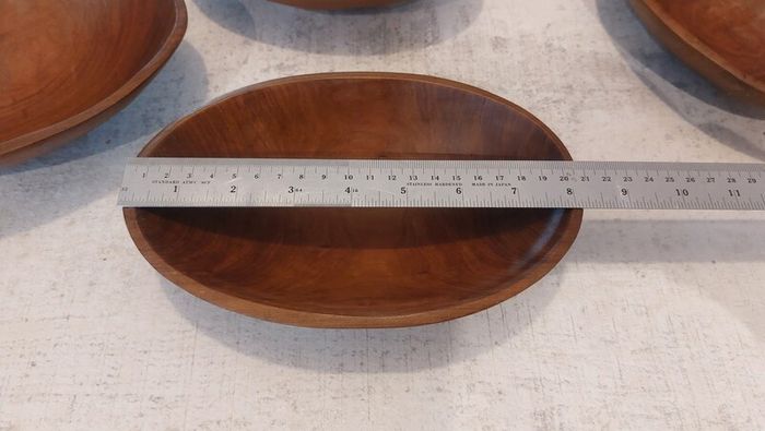 Lovely Set of Four Vintage Mid Century Modern Hand-Carved Wood Nibbles Bowls in Excellent Condition.