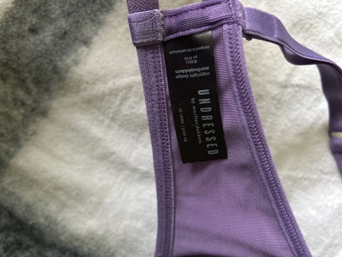 Undressed purple bra