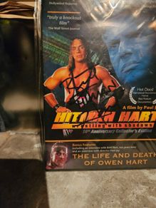 Bret Hart signed wrestling dvd with Owen Hart dvd