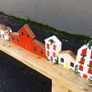 rustic wooden floating shelf display featuring a hand-painted village scene Image 3