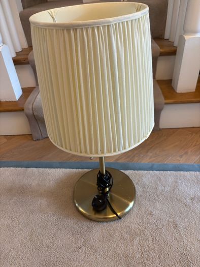 Pair of Ikea (brass effect) lamps with Pooky cream coloured pleated shades
