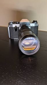 PRAKTICA PL Noval Film Camera with 80 - 200mm HANIMEX lens and camera bag.