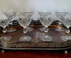 Exquisite vintage set of eight Webb Corbett cut crystal champagne glasses set on an ornate viners silverplate tray