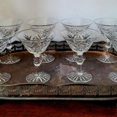 Exquisite vintage set of eight Webb Corbett cut crystal champagne glasses set on an ornate viners silverplate tray