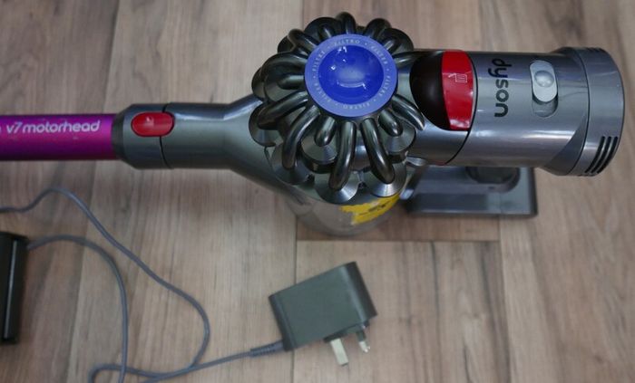 Dyson V7 Motorhead Stick Vacuum Cleaner (works well)