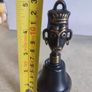 Collectable  african mask Hand Brass Bell. Image 2