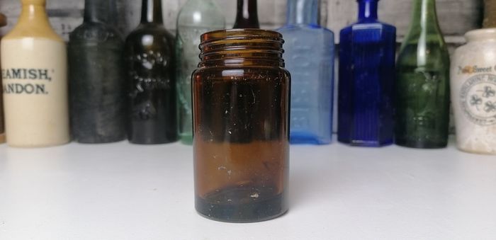 82 - Vintage Kruschen Salts Dark Brown Glass Bottom Embossed Bottle