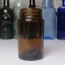 82 - Vintage Kruschen Salts Dark Brown Glass Bottom Embossed Bottle Image 2