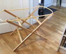 Wooden Moses basket stand.