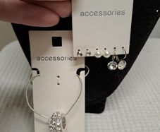 Silver necklace and multiple earrings set
