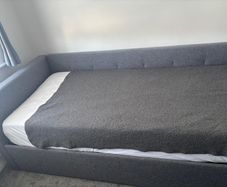 Grey Upholstered Daybed with Trundle and Mattresses
