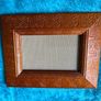 Hand-carved vintage wooden picture frame with a natural grain finish. Image 2